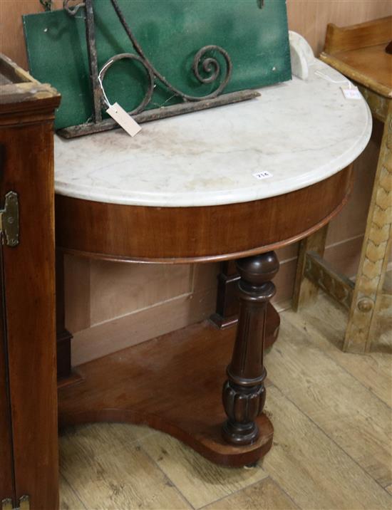A Victorian mahogany marble top demi lune washstand W.88cm
